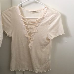 Cream color. Stretch fabric.